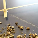 Horloge murale noire et or design moderne minimaliste ronde Black Moon Catalogue